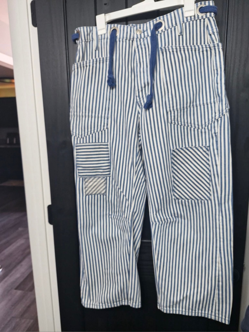 Free People blue and cream stripped barrel jeans with tie